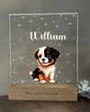 a glass picture frame with a puppy on it