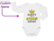 a baby bodysuit with the words party like a king henry