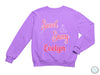 a purple sweatshirt that says sweet sassy evelyn