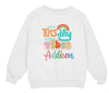 a white sweatshirt with the words tuesday vibes and a rainbow on it