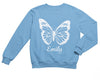 a blue sweatshirt with a white butterfly on it